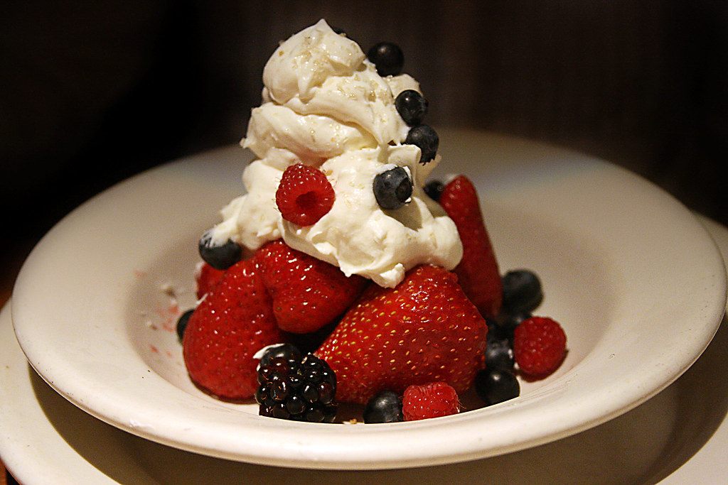 A photo of vanilla pudding fruit dessert
